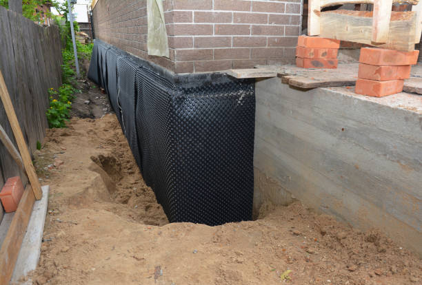 Happy homeowners after waterproofing job in Allendale